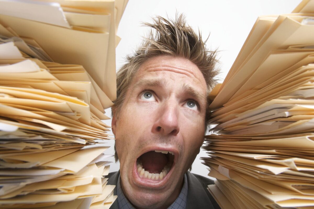 Man overwhelmed with work
