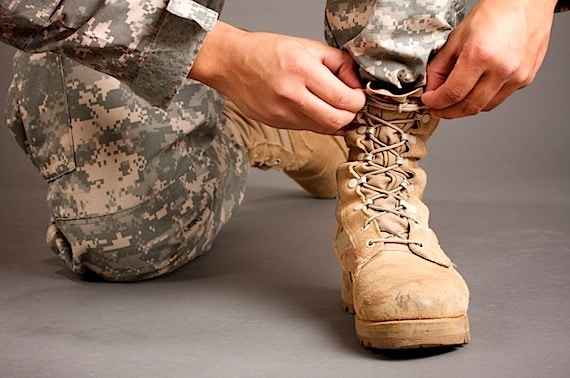 A soldier Lacing Up His Boots - Photo courtesy of ©iStockphoto.com/carlofranco, Image #8614676 A soldier Lacing Up His Boots - Photo courtesy of ©iStockphoto.com/carlofranco, Image #8614676