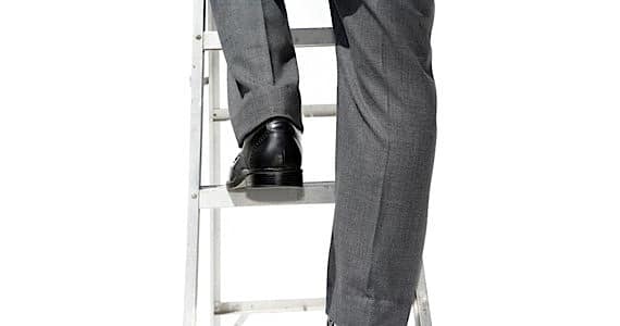 Man Climbing a Corporate Ladder - Photo courtesy of ©iStockphoto.com/ftwitty, Image #10153626 Man Climbing a Corporate Ladder - Photo courtesy of ©iStockphoto.com/ftwitty, Image #10153626